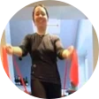 Elite Health Client "Emma" exercising with resistance bands